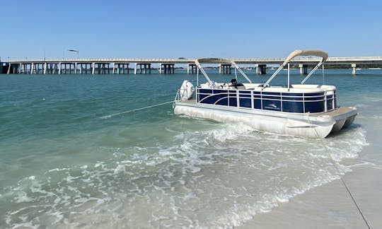 24' Tritoon Bennington with new 175 Hp Suzuki Outboard for rent in Holmes Beach!