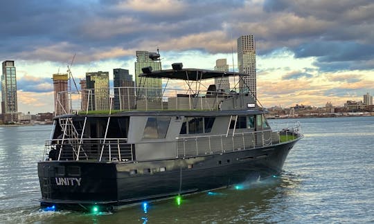 Custom Hatteras Motor Yacht in Vibrant NYC (Up to 35 Guests)