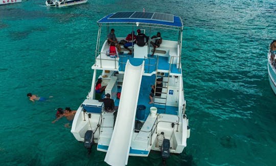 Party Catamaran with Slide for Snorkeling/Half a Day Trip in Punta Cana