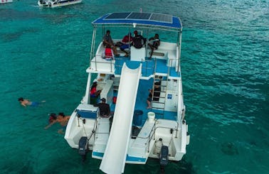 Party Catamaran with Slide for Snorkeling/Half a Day Trip in Punta Cana