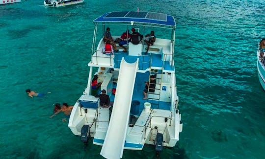Party Catamaran with Slide for Snorkeling/Half a Day Trip in Punta Cana