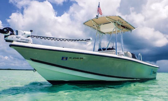 "Piano Piano" Triton 218 Bay Explorer Center Console Rental located in Naples, Florida