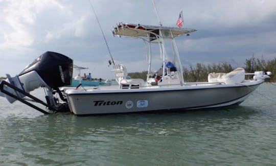 "Piano Piano" Triton 218 Bay Explorer Center Console Rental located in Naples, Florida