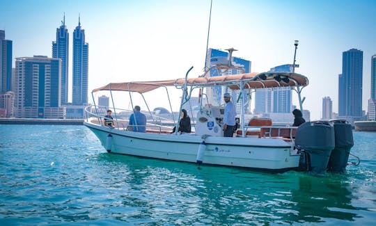 Seeb. Marine Boat cruising around Water Garden City Bay