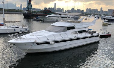 Simple White Motor Yacht for Charter in Hong Kong Island