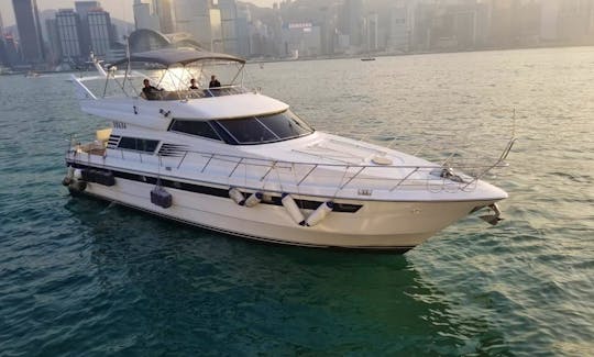Simple White Motor Yacht for Charter in Hong Kong Island