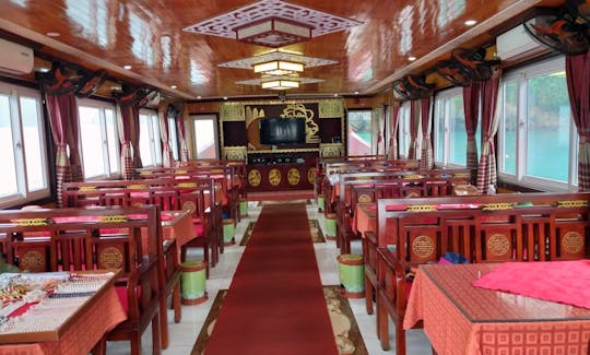 One day Halong Tour Aboard Traditional Canal Boat in Ha Long