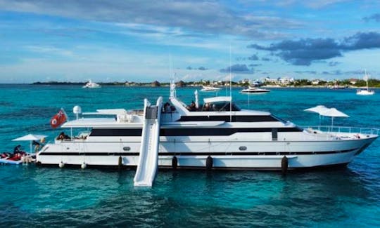 110ft Power Mega Yacht Charter with 2 Jet Ski and water slide! Up to 15 People in Cancún Quintana Roo