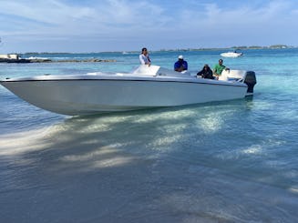 Associez vos expériences insulaires au bateau à moteur Wellcraft Scarab