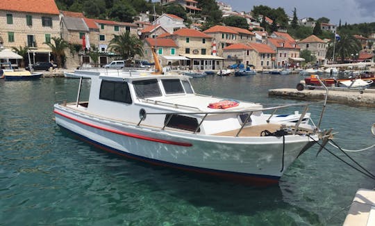 Blue Lagoon and Šolta island with a Traditional Woodenboat