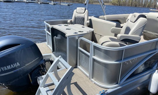 150 Yamaha 4 Stroke Motor, fishing captains chairs, live well and swimming ladder.