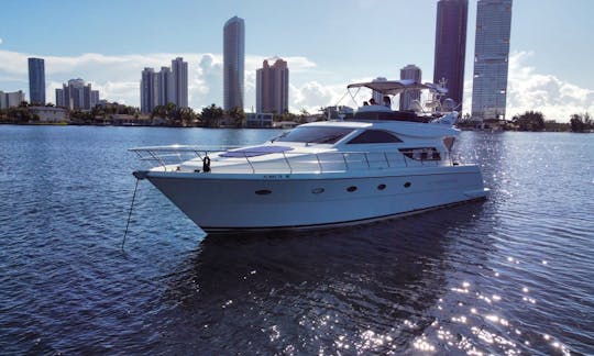 Enjoy The Water With The Famous 60ft Uniesse Fly Bridge Power Mega Yacht in Aventura, Florida