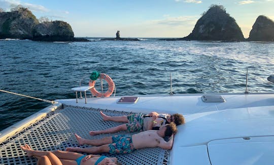 Do these kids know how to enjoy a catamaran or what?