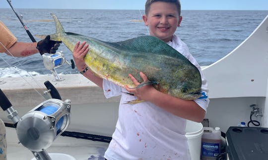 Jaxson with his first mahi