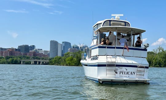 At anchor overlooking Rosslyn, room to spare on the aft deck, set up with teak furniture and a grill for use by renter