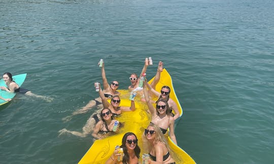 Double Decker Party Boat with a Waterslide and Lily Pad on Lake Travis