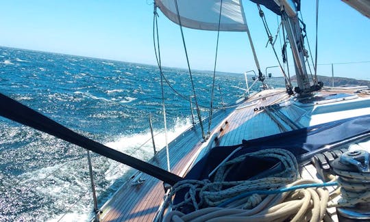 Under lively sail, in the usual afternoon winds of the Western Algarve.