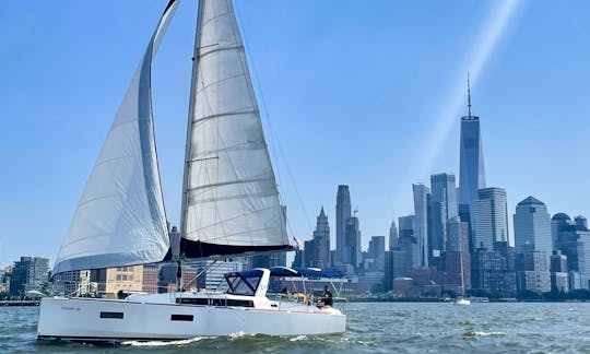 Cruise the Manhattan skyline aboard a modern, professionally maintained cruising sailboat.