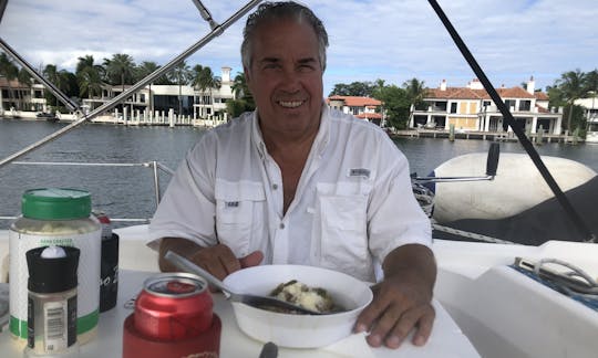 Capt Mark Dining in Lake Santa Barbara, Pompano Beach, FL