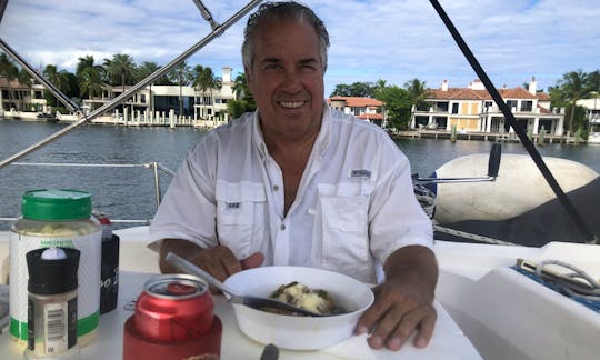 Capt Mark Dining in Lake Santa Barbara, Pompano Beach, FL