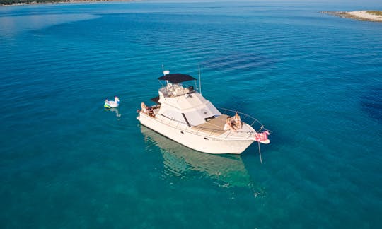 Private Boat Tour In Medulin on a Vintage sport Fishing Boat