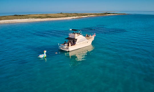 Book a Private Boat Tour In Medulin on a Vintage sport Fishing Boat