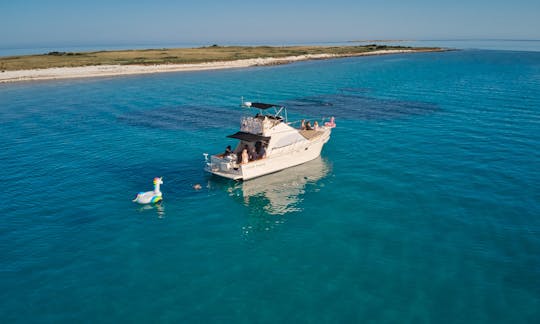 Private Boat Tour In Medulin on a Vintage sport Fishing Boat