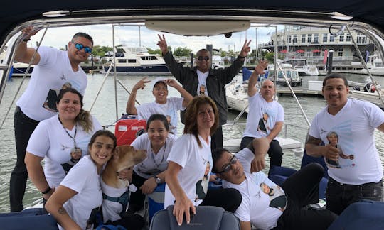 10 Guests on the Aft Deck Counting the Dog