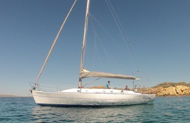 Mayurca Cruising Monohull, Full Day trip in Fornells, Menorca