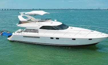 65' FLYBRIDGE Yacht up to 12 guests Day/Night (Jetski optional)