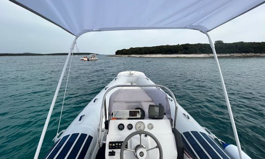 Explore the beautiful waters of Rovinj aboard Jonhson 140 RIB