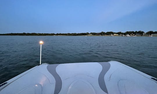 The boat has lights for an evening cruise.