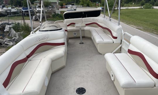 24ft Bentley Pontoon with lily pad, tubes, and a diving board!