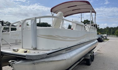 24ft Bentley Pontoon with lily pad, tubes, and a diving board!