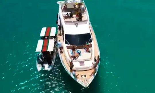 Sound Boat alongside yacht