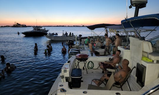 Cruzeiro exclusivo ao pôr do sol em Galveston a bordo do barco pontoon!