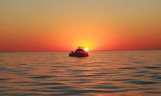 Cruzeiro ao pôr do sol em St Martin com o catamarã Lagoon 450 Cruising!