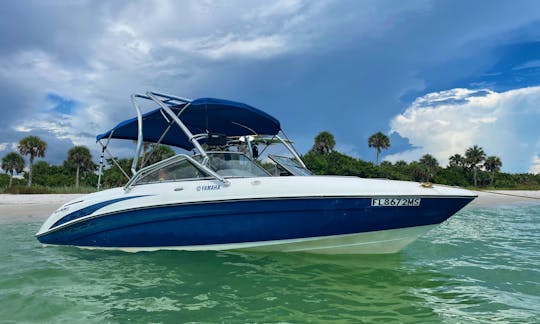 23 foot, 10-person dual engine wakeboard boat with subwoofer and toys!