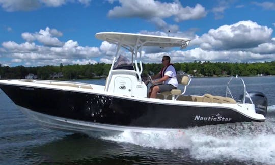 Let me take you to Sanibel to inspect your property. 24' Center Console can carry all your items back home