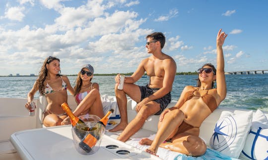 Cruise on a beautiful 51ft SeaRay Sundancer from the heart of Miami Beach