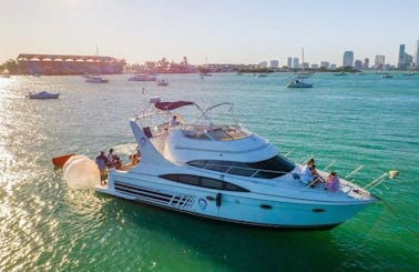 50' Carver with Free Jetski and Huge Speakers for Up to 13 guests in Miami
