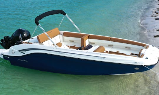 Beautiful Bayliner Deck Boat with rear facing seat to cruise and explore Sarasota,  Siesta Key and Lido Key!