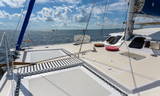 48 Ft Catamaran sailing on the Biscayne Bay . Party, Sound healing, Wingfoil