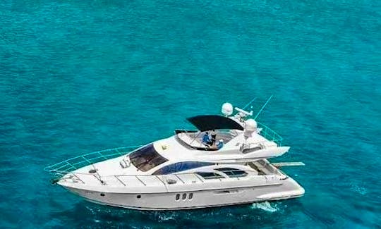 Visit Saona Island and La Palmilla Natural Pool SandBar in this 55' Azimut Motor Yacht