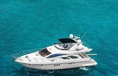 Visit Saona Island and La Palmilla Natural Pool SandBar in this 55' Azimut Motor Yacht