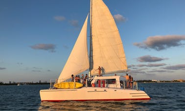 This Catamaran Party Boat accommodates up to 49 people with a captain and crew!