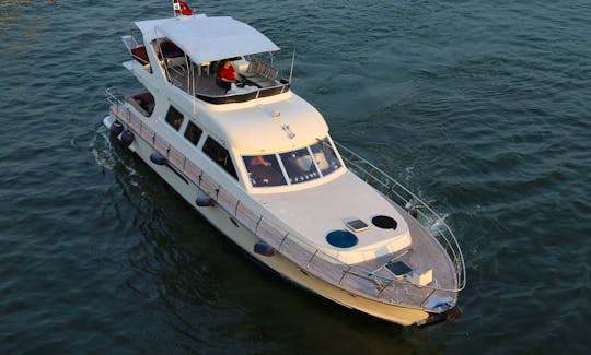 Book the amazing 63ft ELF Motor Yacht for 12 people P32!