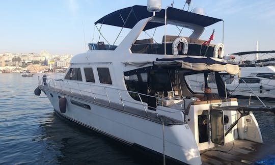 Book the amazing 63ft ELF Motor Yacht for 12 people P32!