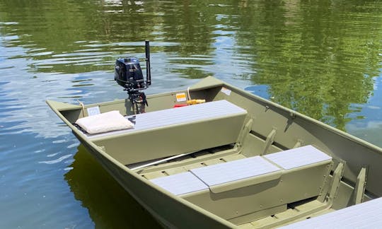 14'  Extra Wide Jon Boat 4HP Tohatsu 4 stroke with Prop Guard for Manatees holds up to 6 people.