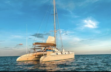 Enjoy a day or a week sailing on the clearest waters | 55ft Outremer Sailing Catamaran